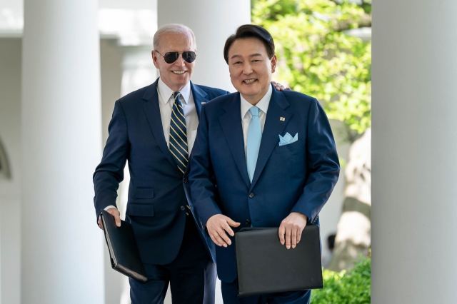 US President Joe Biden and South Korean President Yoon Suk Yeol are briefed in the Oval Office before their joint press conference in the Rose Garden on April 26, 2023, at the White House. (White House)