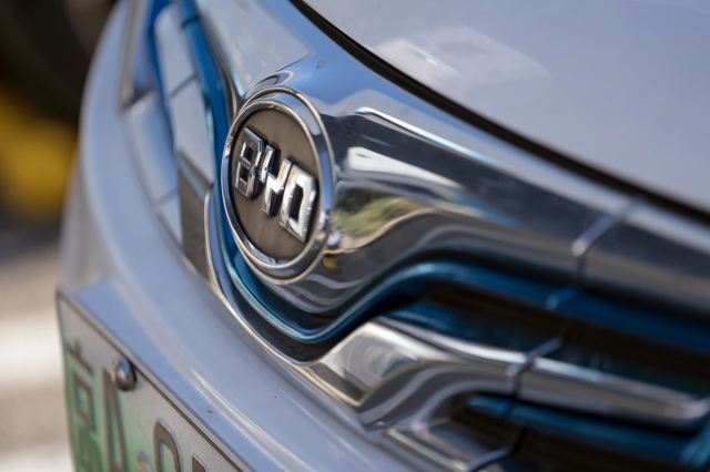 A BYD badge on an electric vehicle outside one of the company's dealerships in Beijing (Bloomberg)