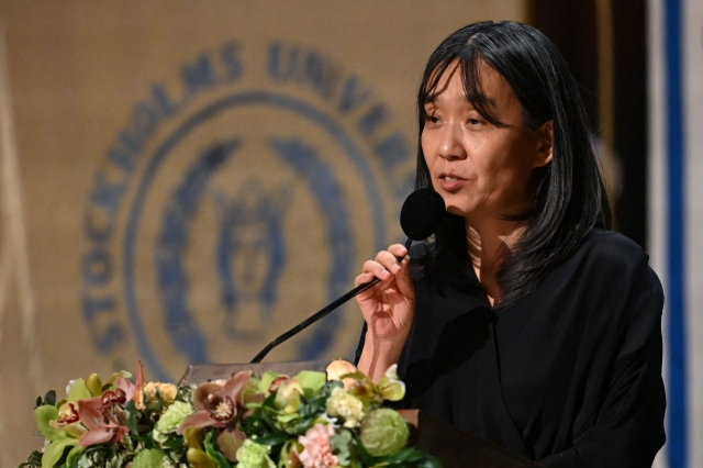 Nobel Prize in literature laureate, South Korean writer Han Kang, delivers a speech during the Nobel Prize banquet at the Stockholm City Hall, Tuesday. (AFP-Yonhap)